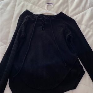 Cris-Cross black light sweater